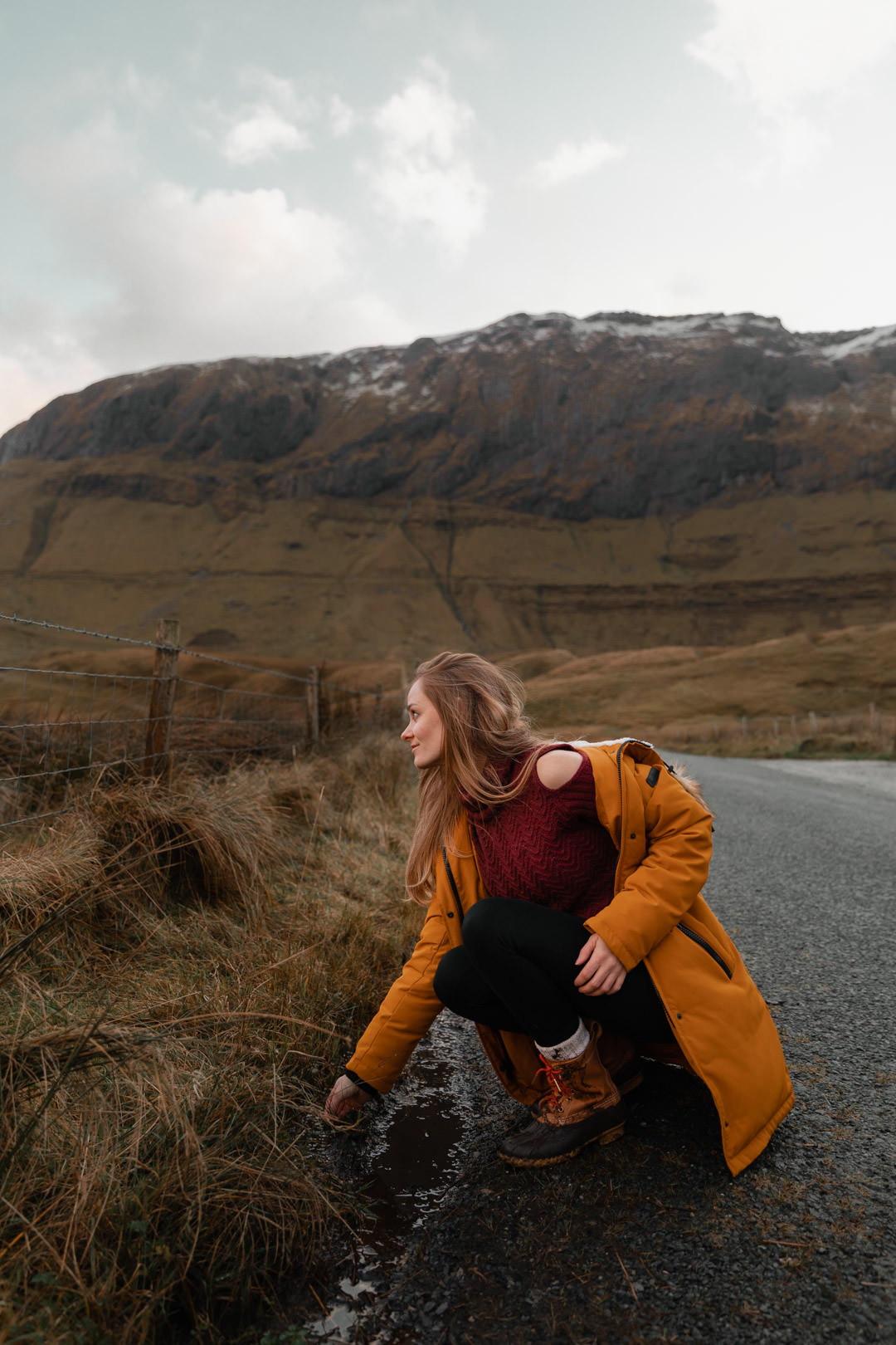 girl kneeling in sligo, ireland