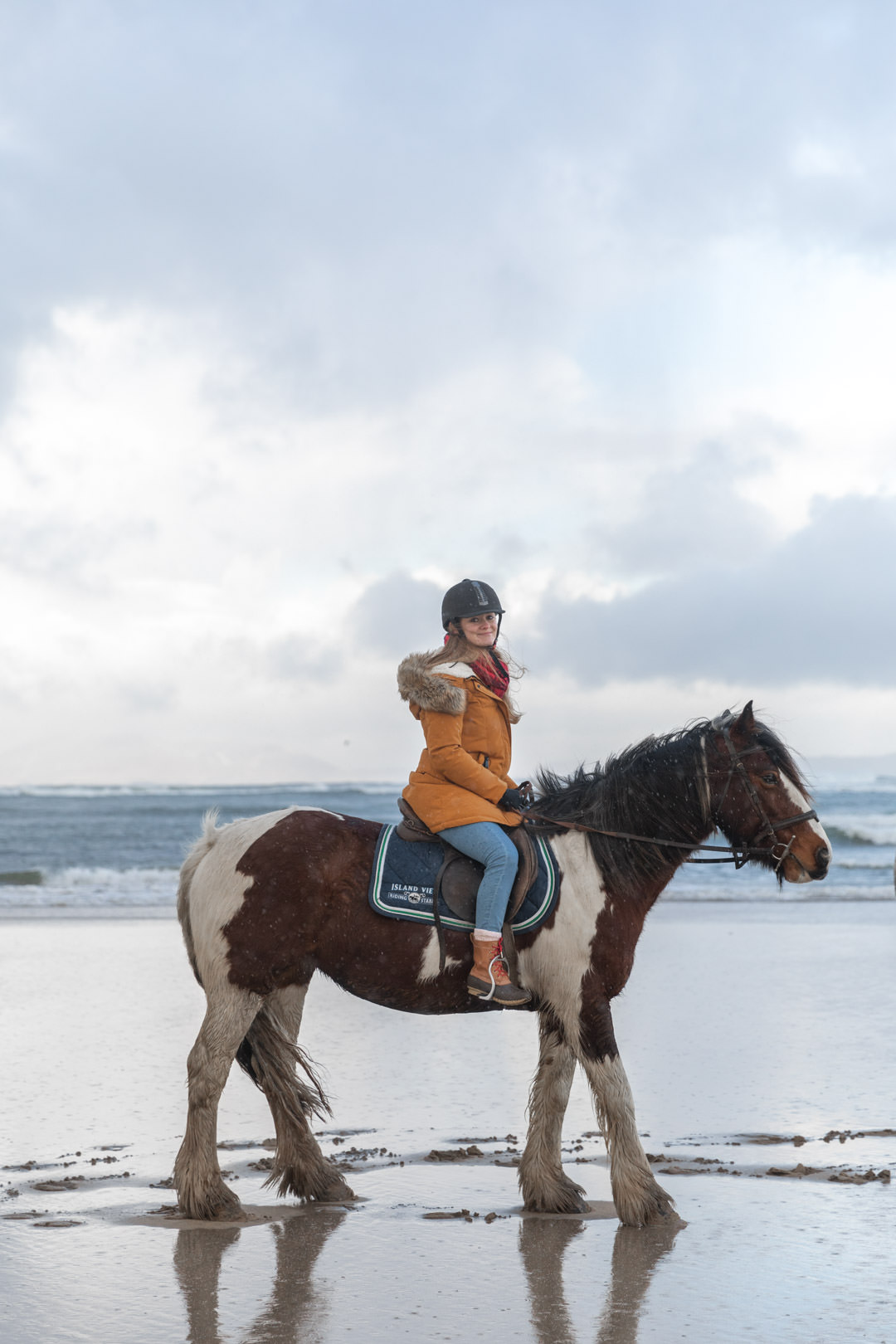 girl on horse on beach