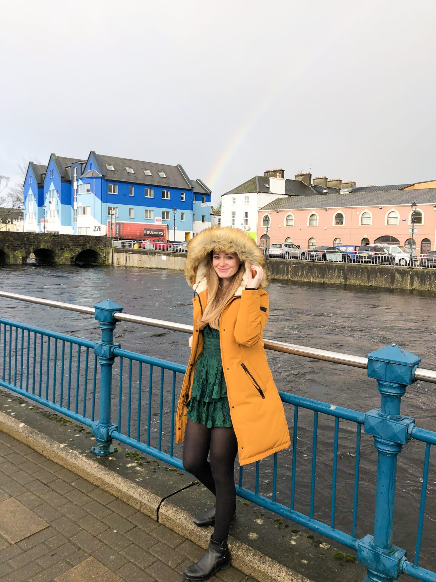 girl and rainbow in sligo town ireland